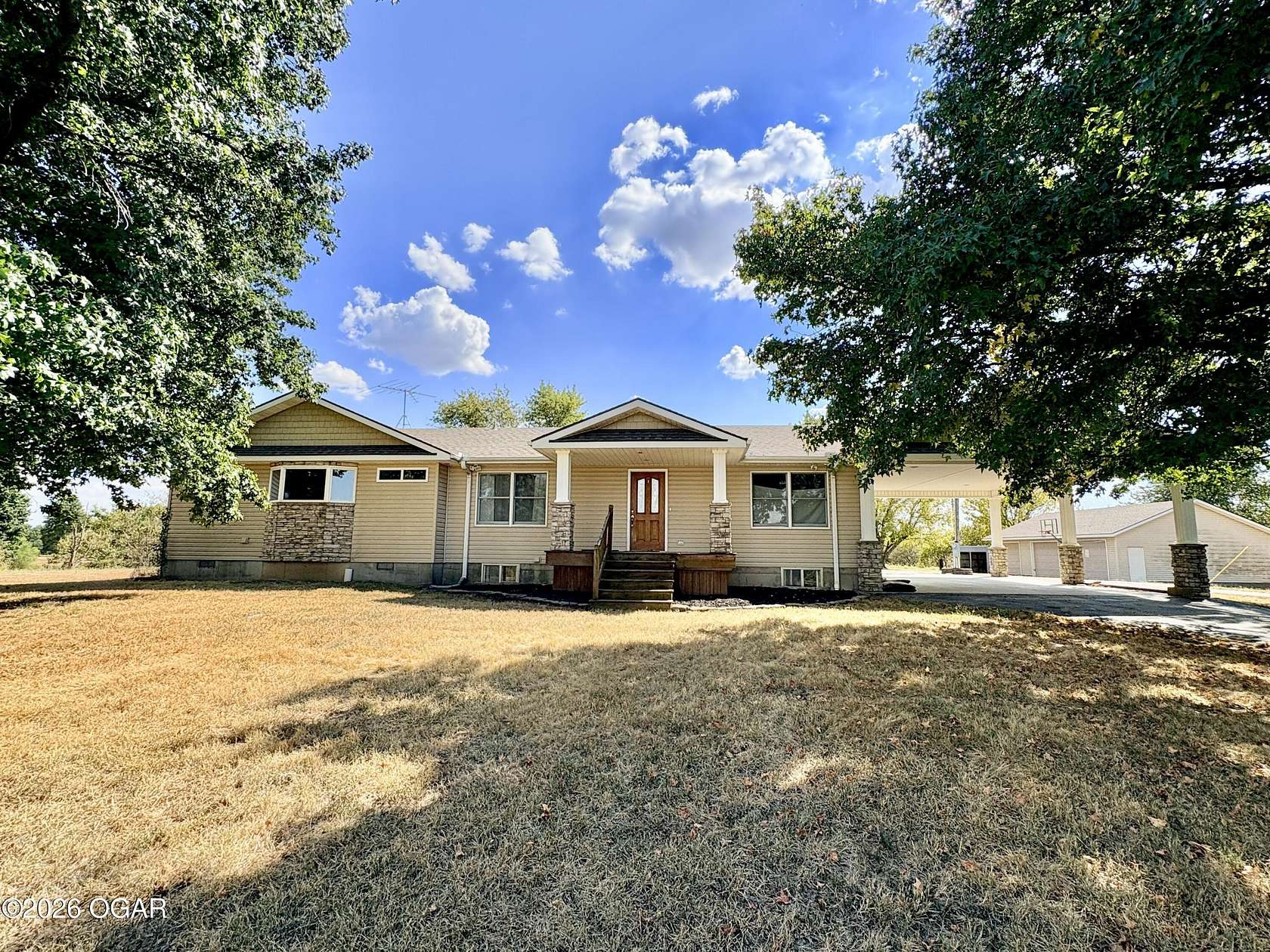 5.2 Acres of Land with Home for Sale in Lamar, Missouri