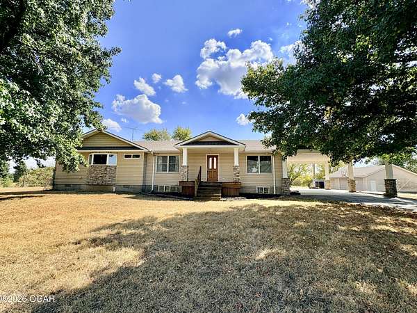5.2 Acres of Land with Home for Sale in Lamar, Missouri