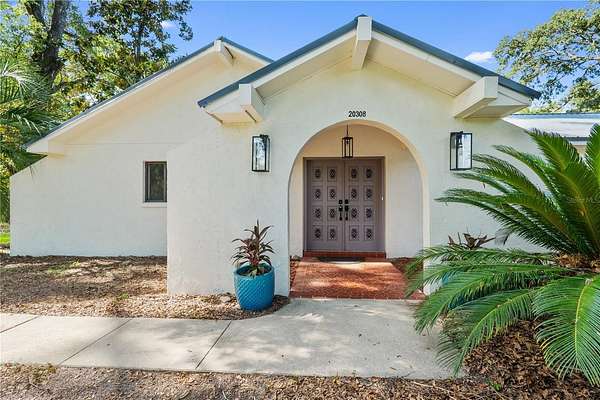 4 Acres of Residential Land with Home for Sale in Alachua, Florida