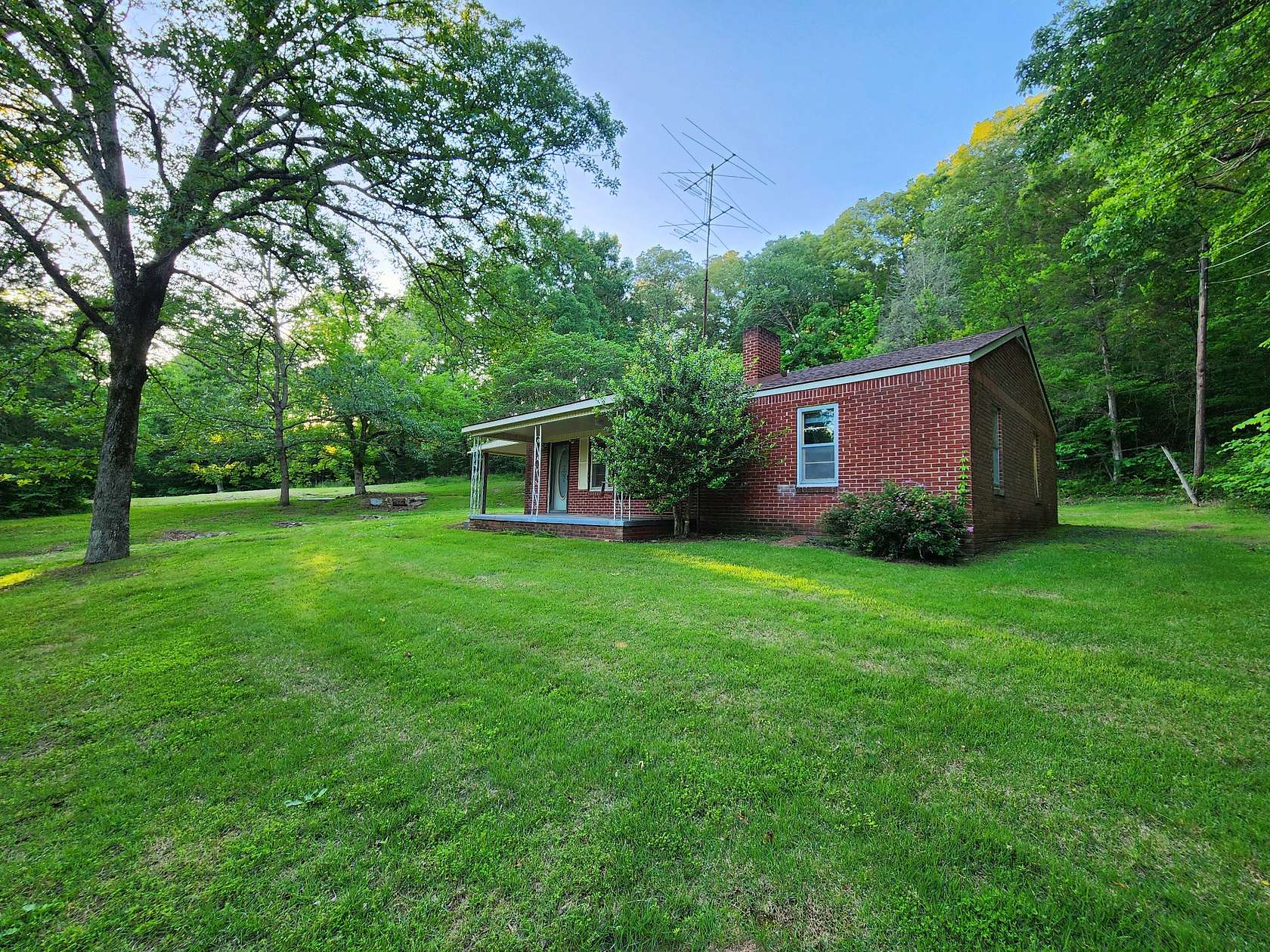 12.5 Acres of Land with Home for Sale in Decaturville, Tennessee