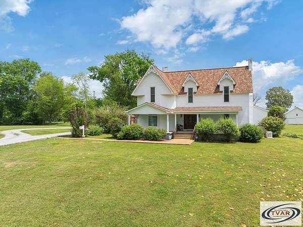 15.7 Acres of Land with Home for Sale in McKenzie, Tennessee