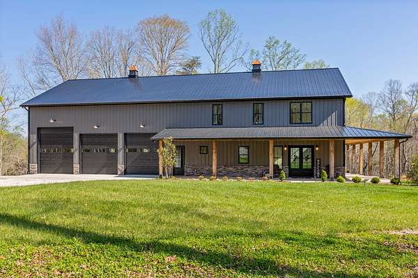 28.9 Acres of Recreational Land with Home for Sale in Burns, Tennessee