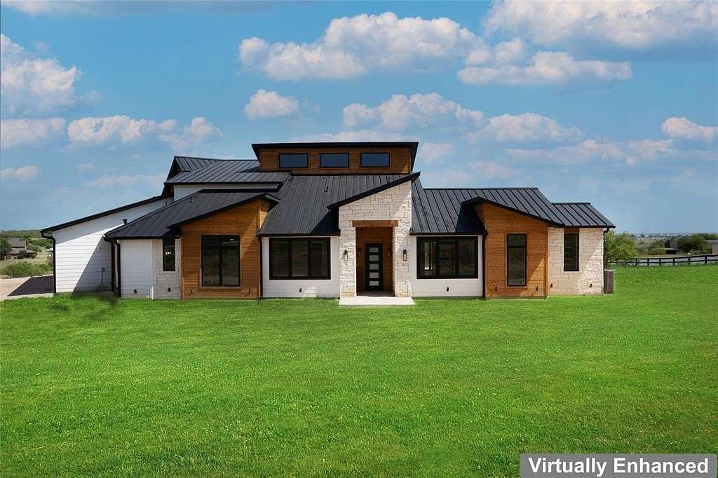 5 Acres of Residential Land with Home for Sale in Ponder, Texas