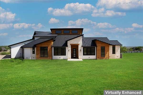 5 Acres of Residential Land with Home for Sale in Ponder, Texas