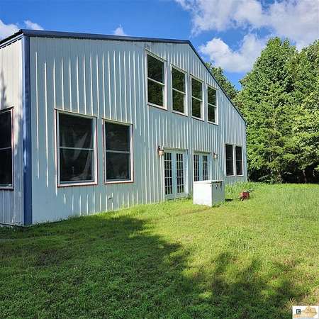 21.6 Acres of Land with Home for Sale in Edmonton, Kentucky