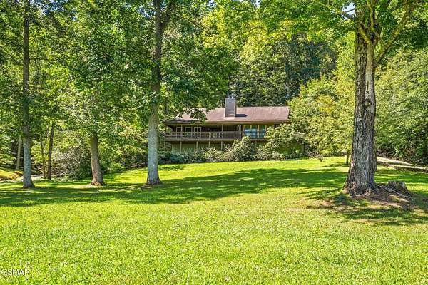 6.6 Acres of Residential Land with Home for Sale in Sevierville, Tennessee