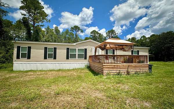 2 Acres of Residential Land with Home for Sale in Lake City, Florida