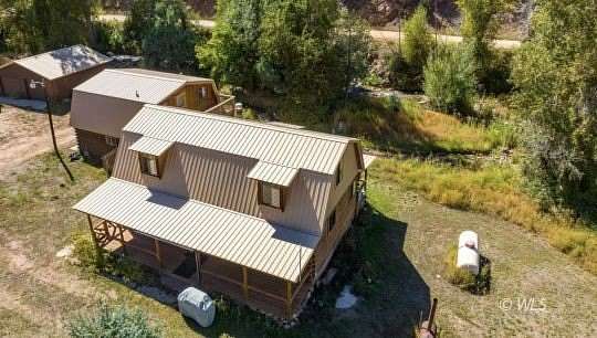 5.35 Acres of Land with Home for Sale in Coaldale, Colorado