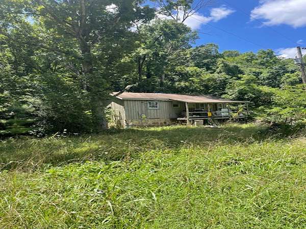 11.2 Acres of Land with Home for Sale in Flippin, Arkansas