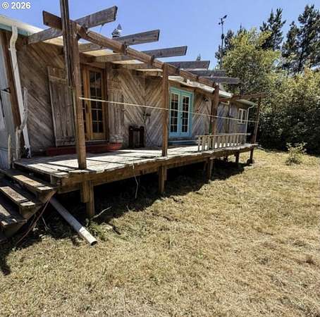 3.44 Acres of Land with Home for Sale in Seal Rock, Oregon