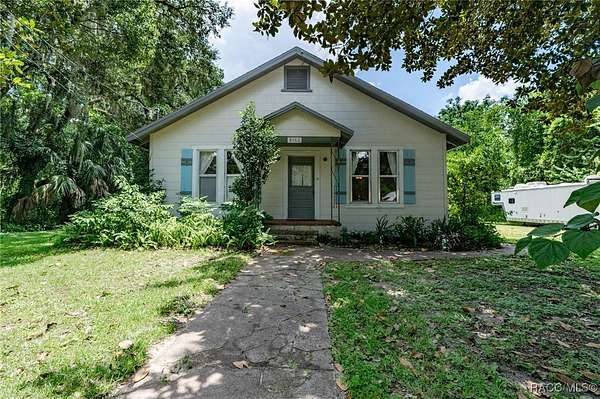 0.89 Acres of Residential Land with Home for Sale in Floral City, Florida