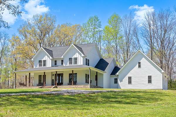 5 Acres of Residential Land with Home for Sale in Erin, Tennessee