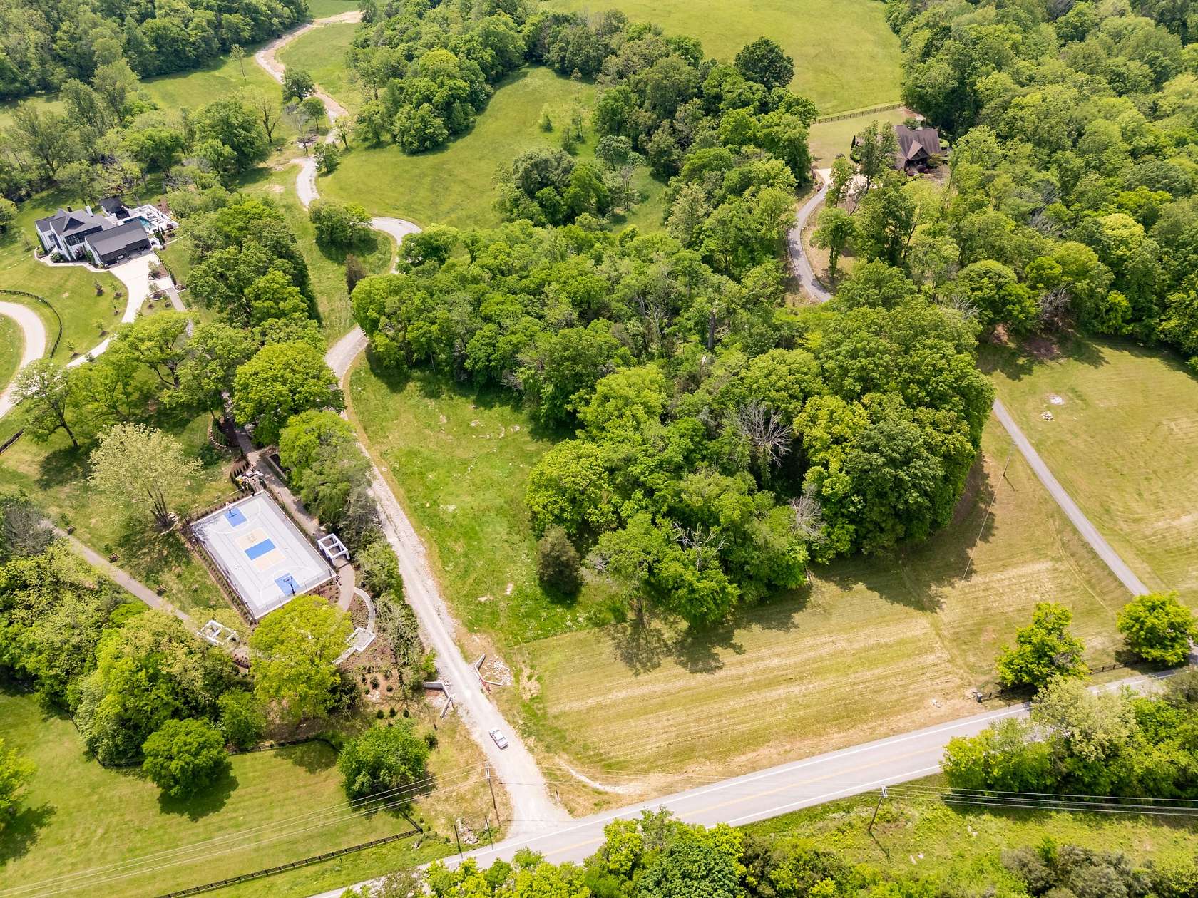 5.12 Acres of Residential Land for Sale in College Grove, Tennessee