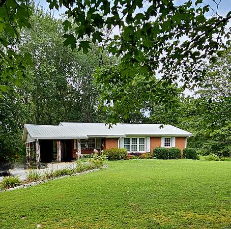 2.88 Acres of Residential Land with Home for Sale in New Johnsonville, Tennessee