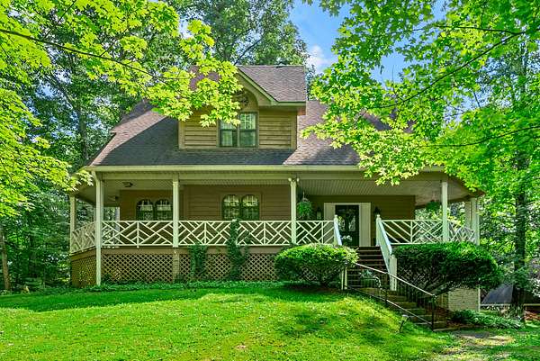 6.1 Acres of Residential Land with Home for Sale in Cumberland Furnace, Tennessee