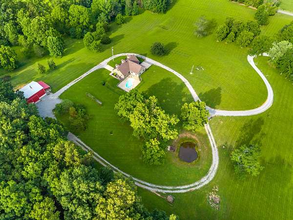 13.5 Acres of Land with Home for Sale in Chapmansboro, Tennessee