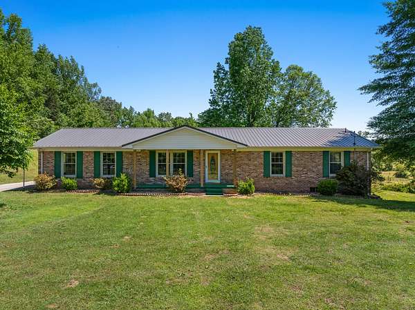 49.8 Acres of Agricultural Land with Home for Sale in Cypress Inn, Tennessee