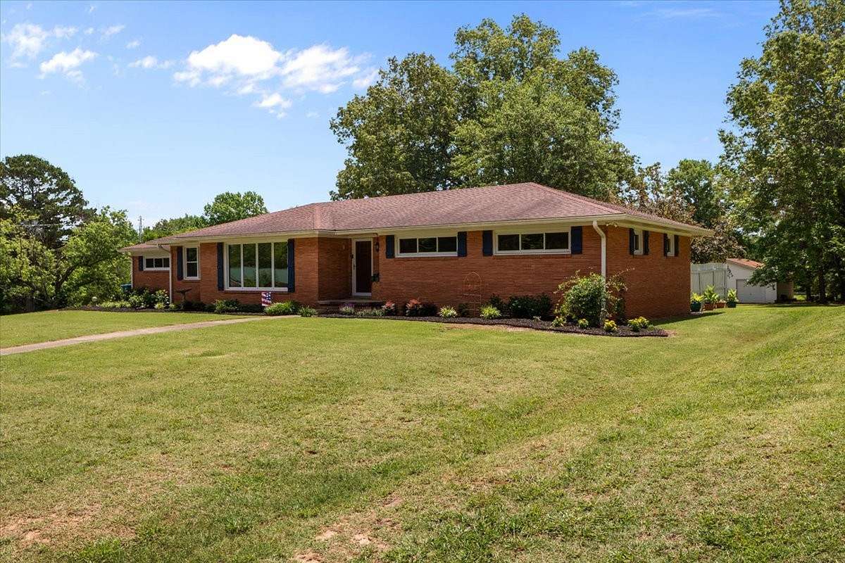 1.5 Acres of Residential Land with Home for Sale in Bruceton, Tennessee