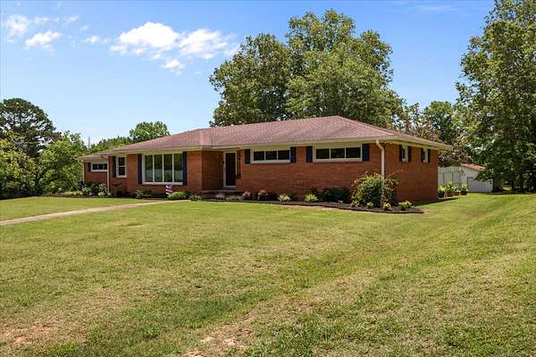 1.5 Acres of Residential Land with Home for Sale in Bruceton, Tennessee