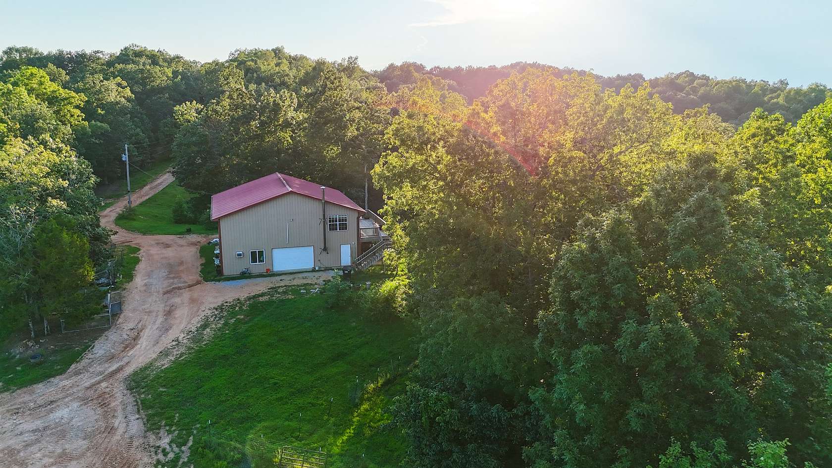 237 Acres of Land with Home for Sale in Linden, Tennessee