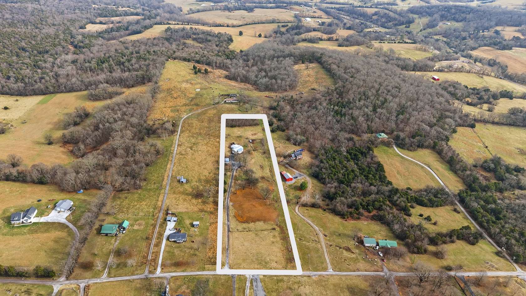 5.4 Acres of Residential Land with Home for Sale in Brush Creek, Tennessee