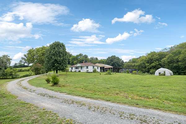 26 Acres of Agricultural Land with Home for Sale in Lynchburg, Tennessee