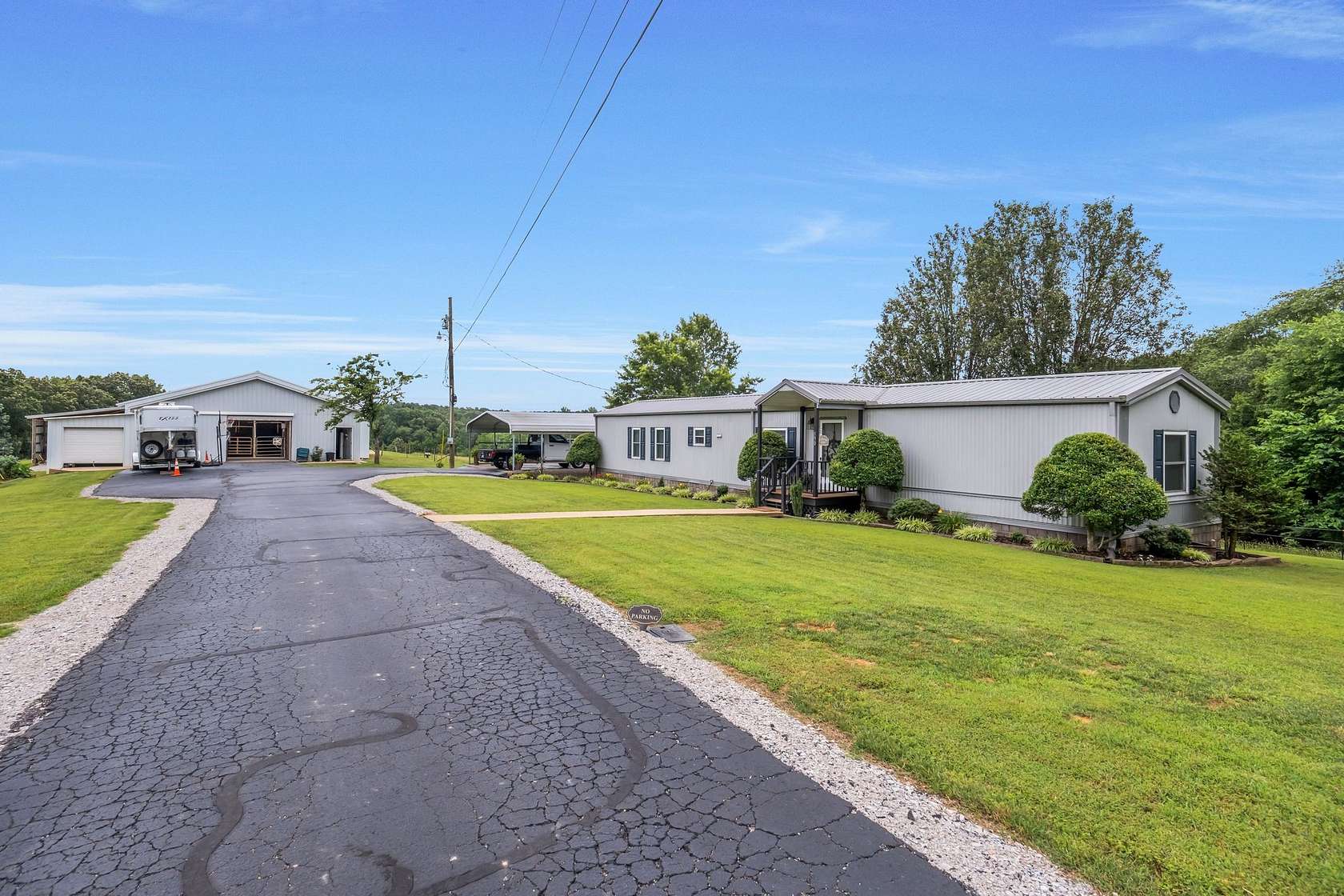 14.7 Acres of Land with Home for Sale in Lexington, Tennessee