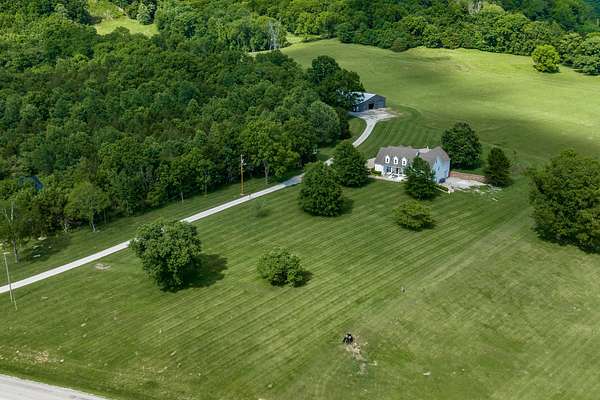 27.6 Acres of Agricultural Land with Home for Sale in Culleoka, Tennessee