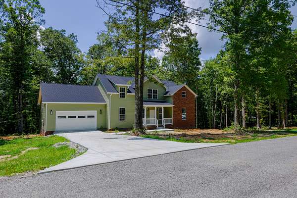 2.3 Acres of Residential Land with Home for Sale in Hohenwald, Tennessee