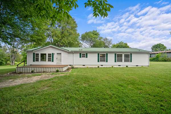 5.1 Acres of Residential Land with Home for Sale in Portland, Tennessee