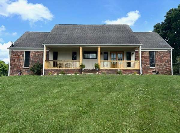 10.7 Acres of Land with Home for Sale in Mount Pleasant, Tennessee
