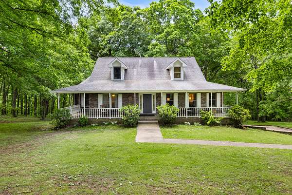 5.2 Acres of Residential Land with Home for Sale in Adams, Tennessee