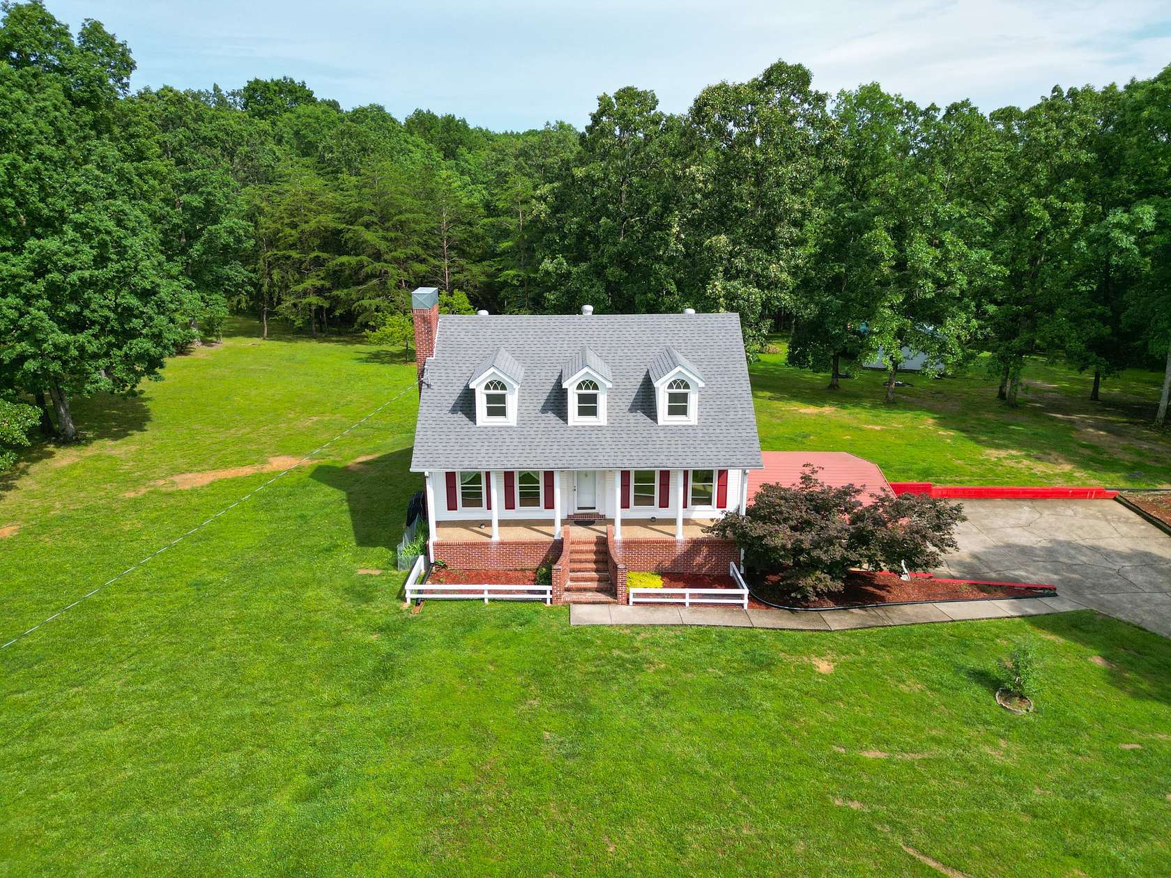 5.5 Acres of Residential Land with Home for Sale in McEwen, Tennessee