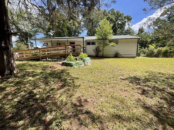 3.1 Acres of Residential Land with Home for Sale in Camden, Tennessee