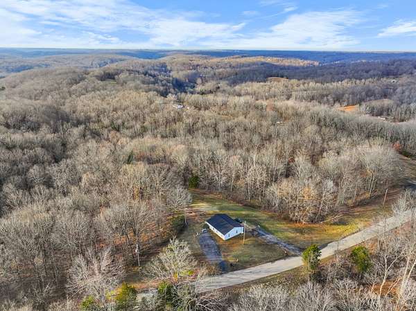 3.29 Acres of Residential Land with Home for Sale in Indian Mound, Tennessee