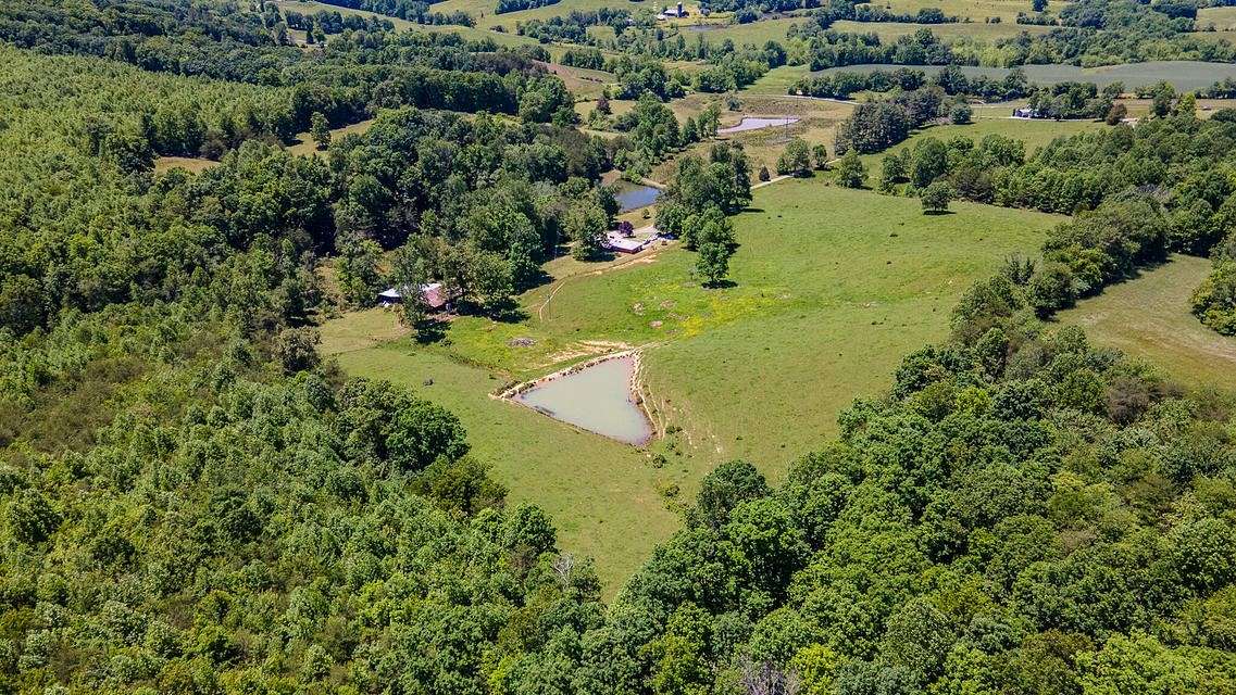 57.7 Acres of Agricultural Land with Home for Auction in Pikeville, Tennessee