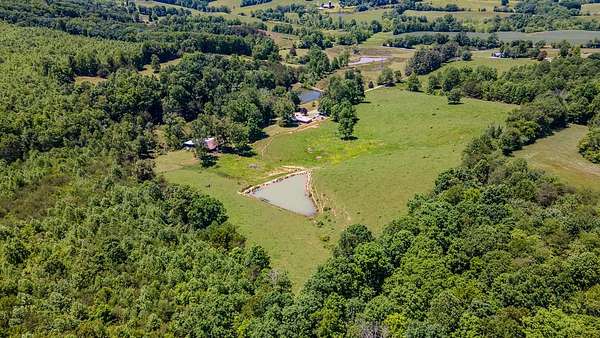 57.7 Acres of Agricultural Land with Home for Auction in Pikeville, Tennessee