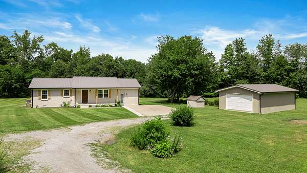 2.9 Acres of Residential Land with Home for Sale in Bradyville, Tennessee