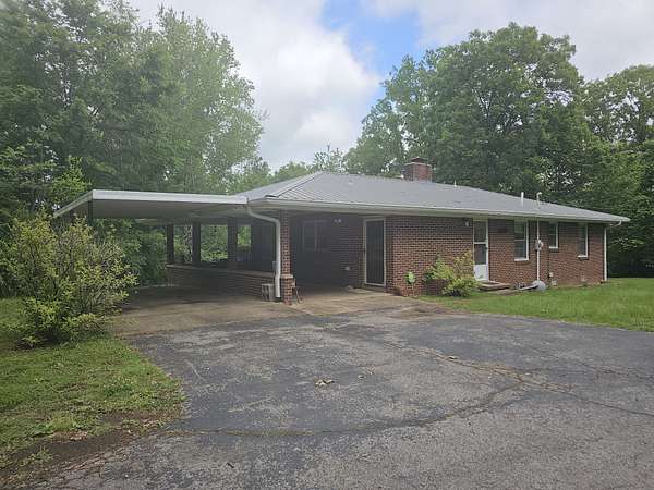 3.8 Acres of Residential Land with Home for Sale in Waverly, Tennessee