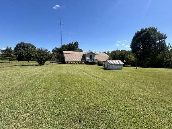 5.7 Acres of Residential Land with Home for Sale in Loretto, Tennessee