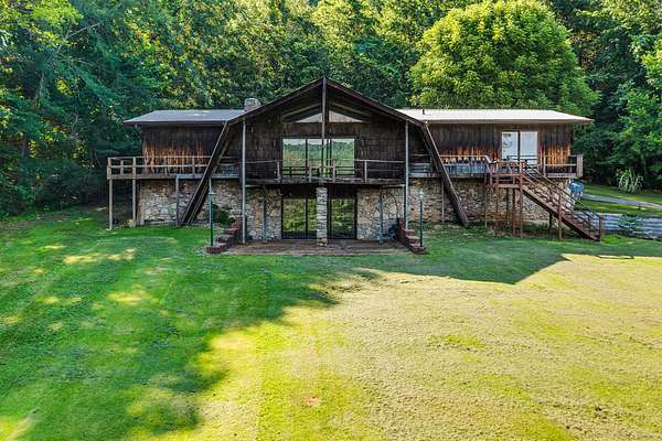 182 Acres of Land with Home for Sale in Linden, Tennessee