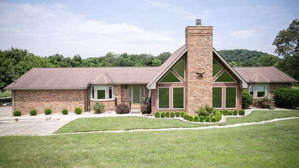 3.88 Acres of Residential Land with Home for Sale in Pegram, Tennessee