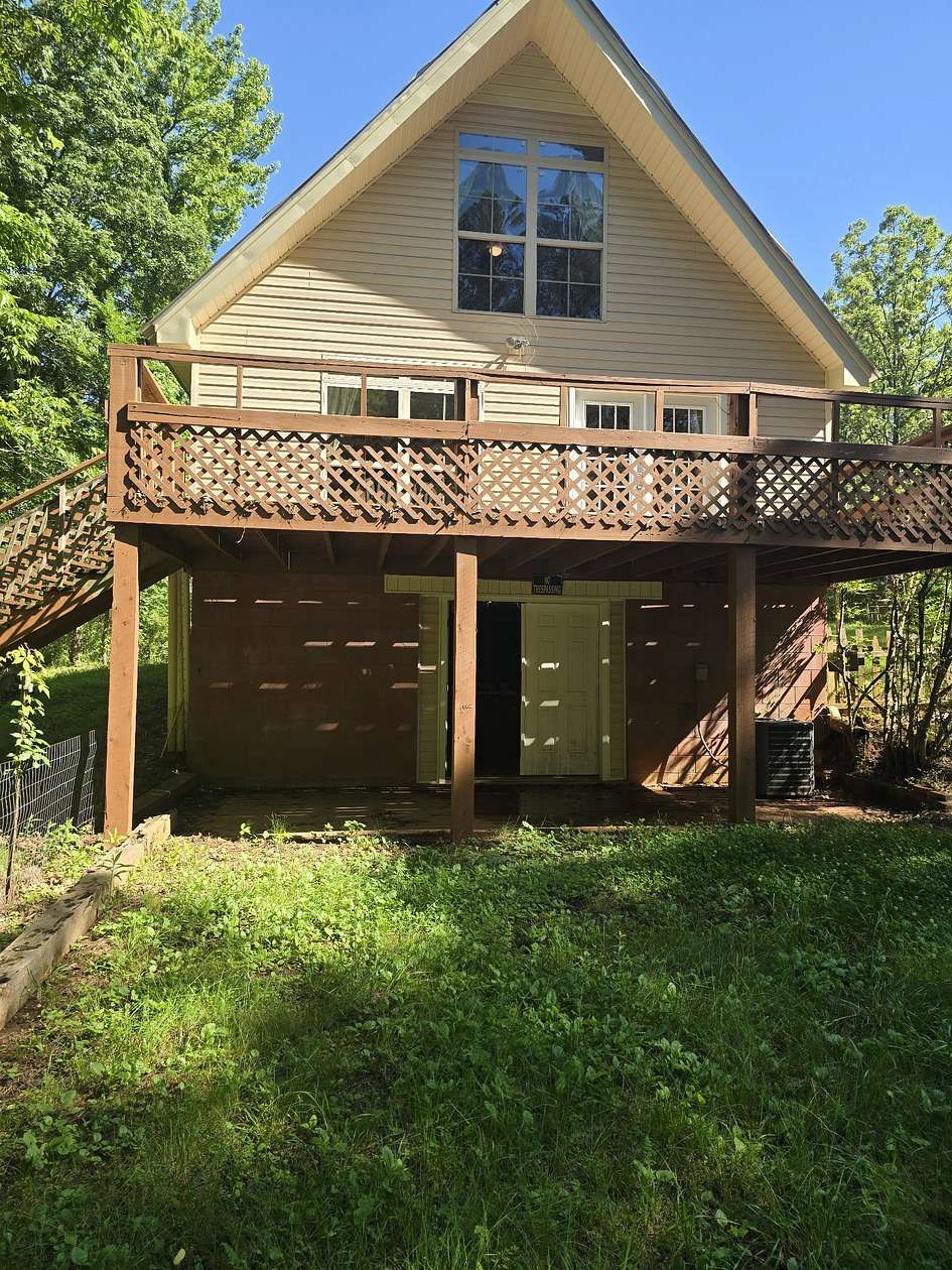 2.5 Acres of Residential Land with Home for Sale in Scotts Hill, Tennessee