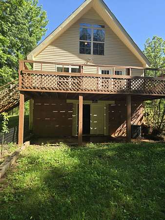 2.5 Acres of Residential Land with Home for Sale in Scotts Hill, Tennessee