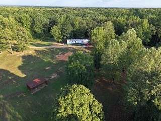 15.2 Acres of Land with Home for Sale in Saltillo, Tennessee