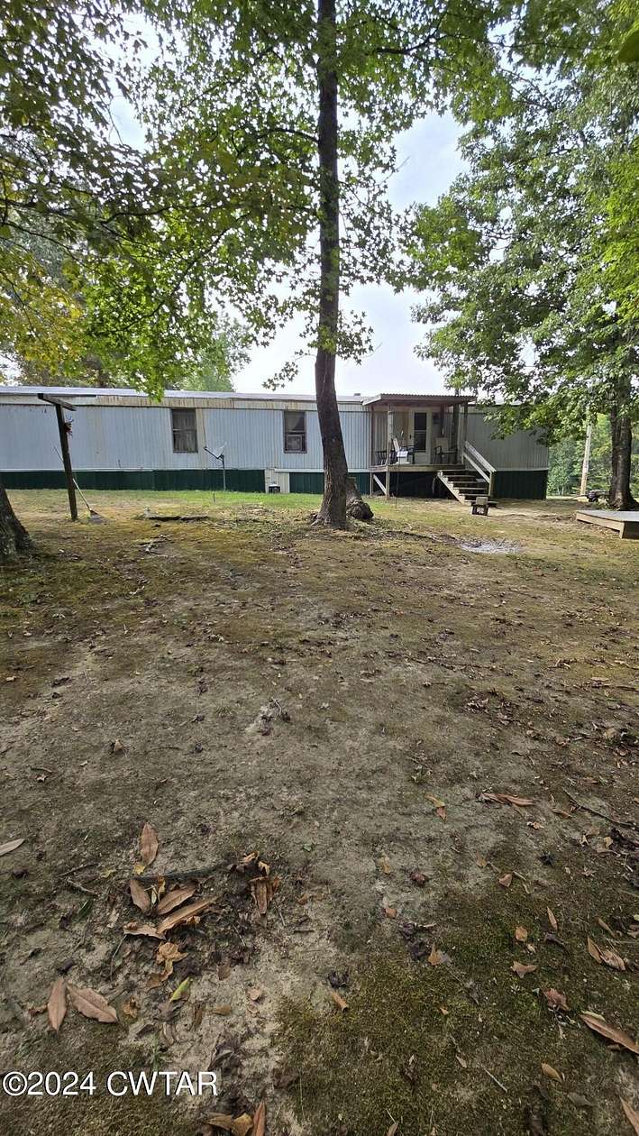 15.2 Acres of Land with Home for Sale in Saltillo, Tennessee