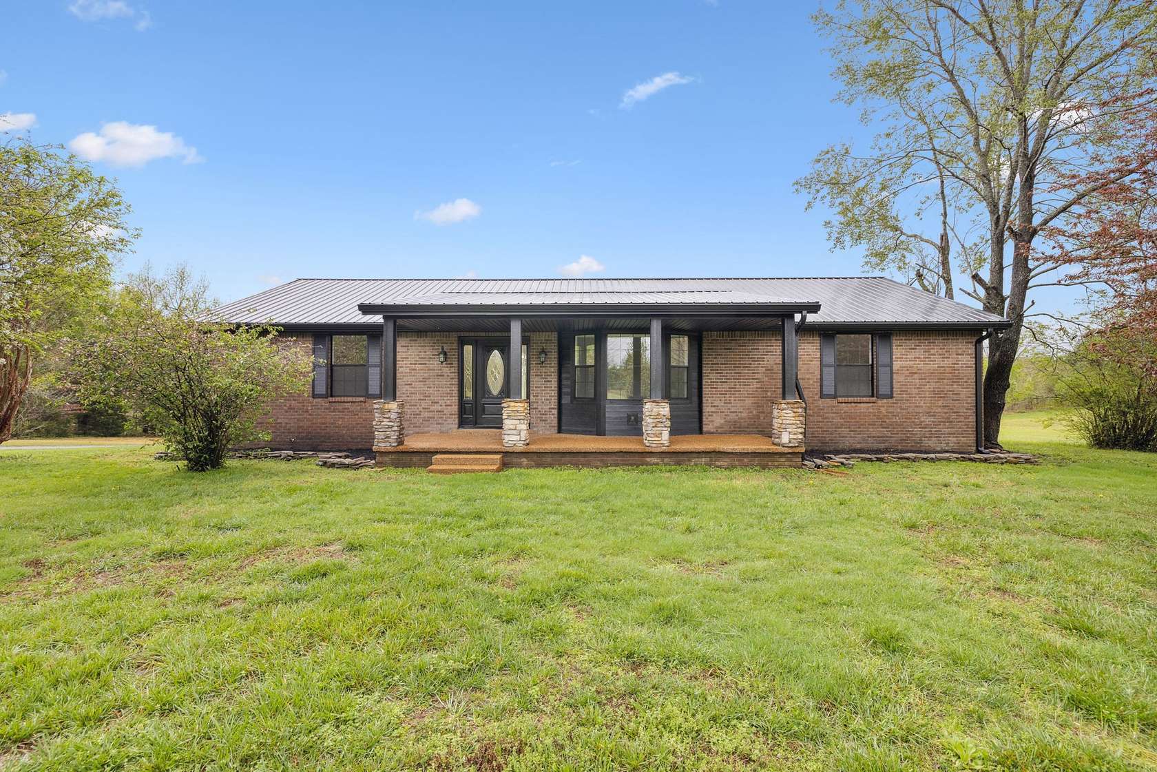 5 Acres of Residential Land with Home for Sale in Bon Aqua, Tennessee