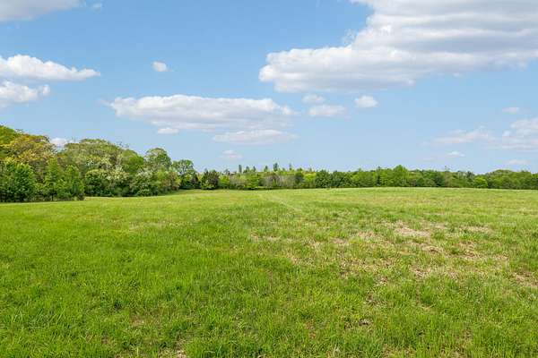 21.8 Acres of Recreational Land & Farm for Sale in Bon Aqua, Tennessee