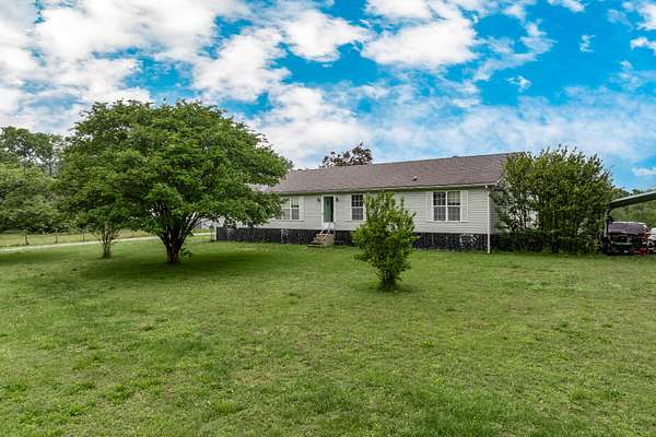 5.1 Acres of Land with Home for Sale in Columbia, Tennessee