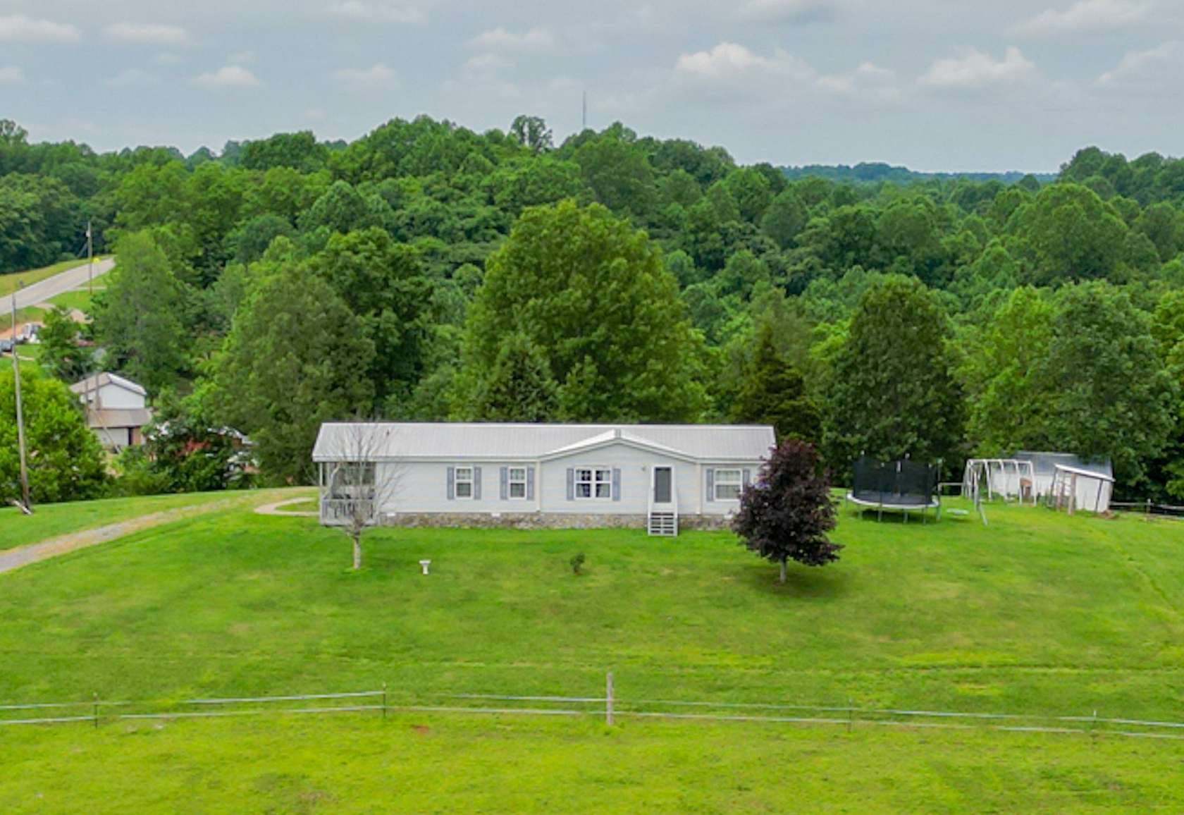 10.4 Acres of Land with Home for Sale in Hartsville, Tennessee
